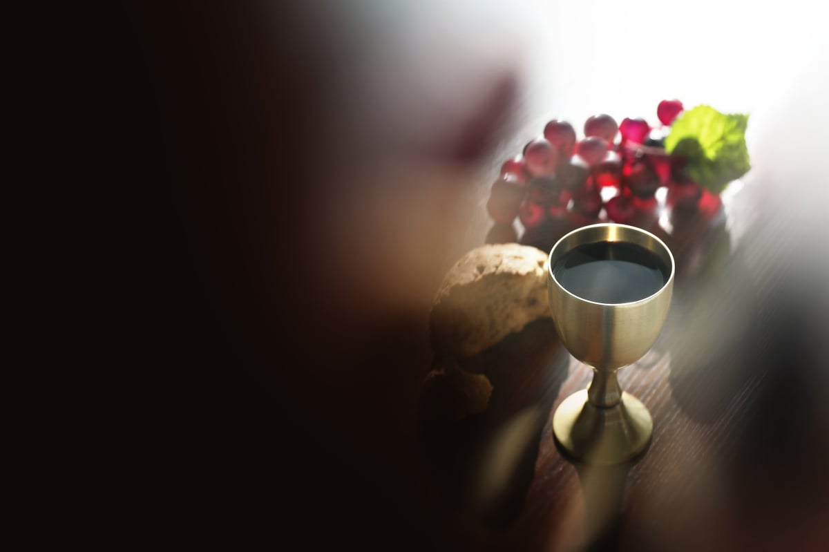 Holy Communion bread and wine, background of the Last Supper of Jesus Christ